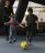 Two young boys playing football inside